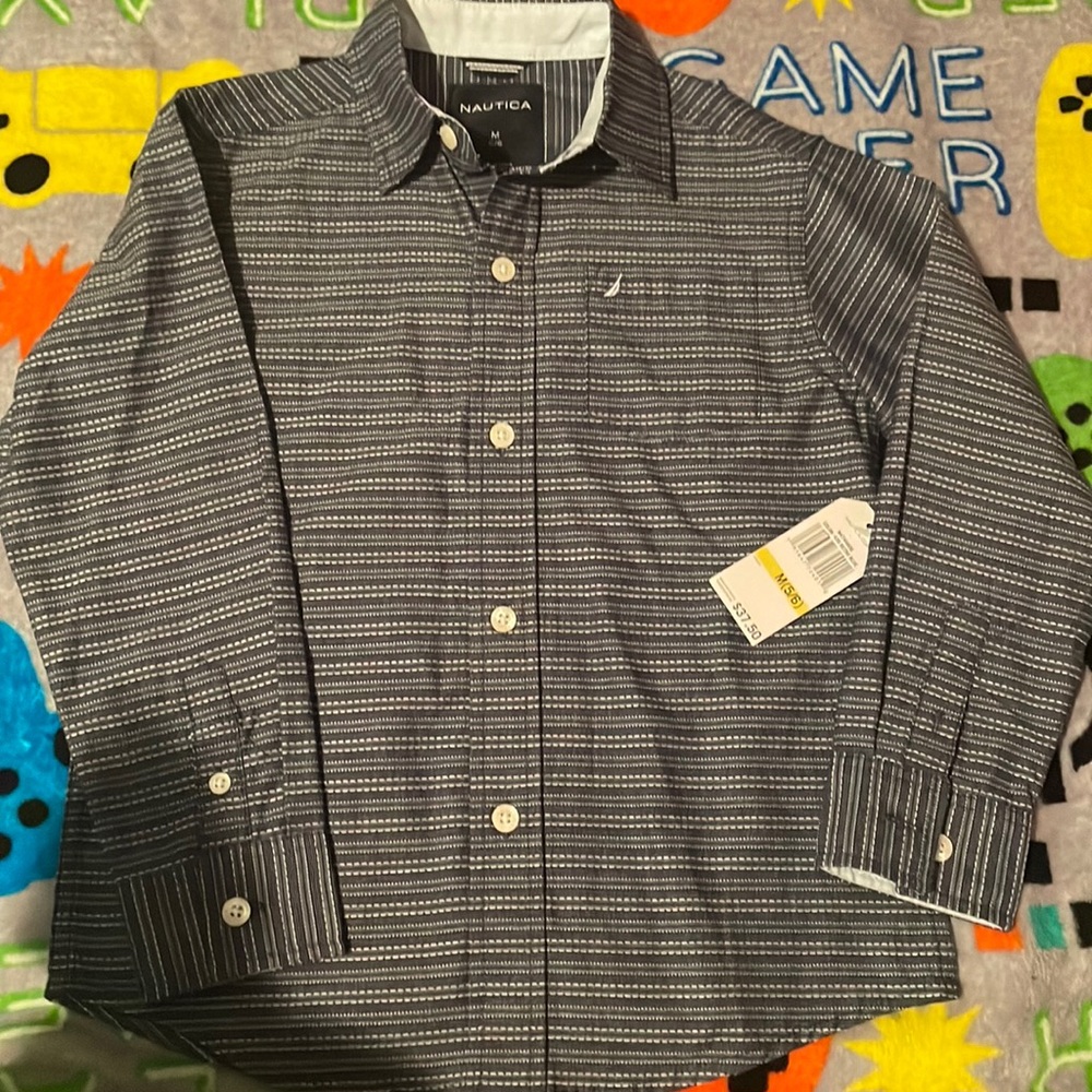 (Jr’s clothes) button down never worn